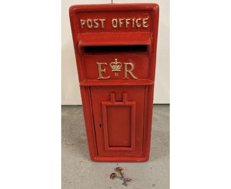 A full sized, red painted, cast metal ER post box with gold painted detail. Complete with keys. 