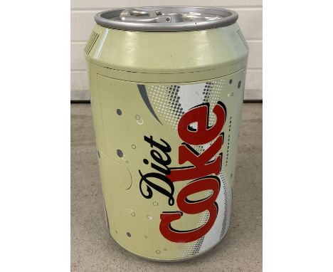 A vintage mini fridge in the shape of a Diet Coke can. Single shelf to interior. 