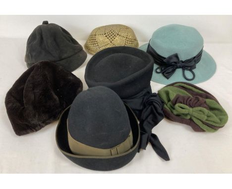 A small collection of vintage hats to include examples from Kangol. 