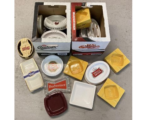 2 boxes of ceramic and glass brewery and smoking branded pub ashtrays. To include Benson &amp; Hedges, Budwieser, Skol, Stell