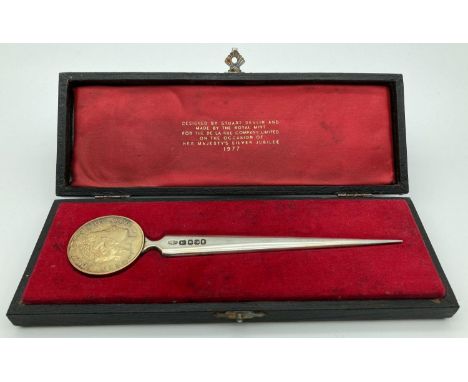 A cased Stuart Devlin silver letter opener made to commemorate the Queen's Silver Jubilee, 1977. In original box, marked that