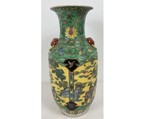 A large Chinese ceramic vase with yellow ground panelled design. Underside signed in blue, with ring mark. 