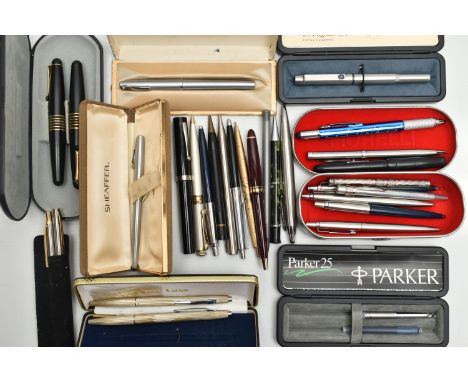 A TIN OF ASSORTED PENS, to include two brushed steel 'Sheaffer' ball point pens with boxes, a boxed 'Parker roller ball' pen,