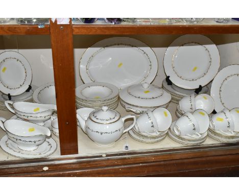 A ROYAL WORCESTER 'GOLD CHANTILLY' PATTERN DINNER SET, comprising eight dinner plates, one meat plate, covered tureen, eight 