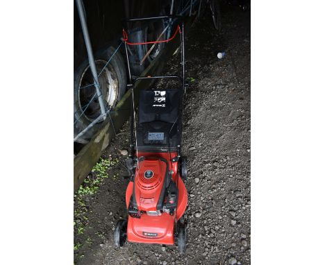 AN EINHALL CP140-B PETROL LAWN MOWER with grass box (UNTESTED BUT ENGINE PULLING FREELY) along with a Summit mountain bike wi