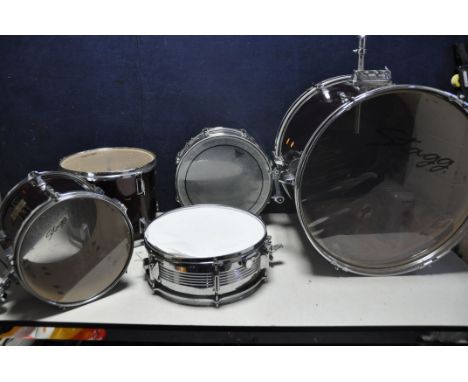 THREE STAG DRUMS comprising a Stagg 22in x 16in, Stagg 12in x 8in, Stagg 13in x 10in along with two chrome 14in x 4in snare d
