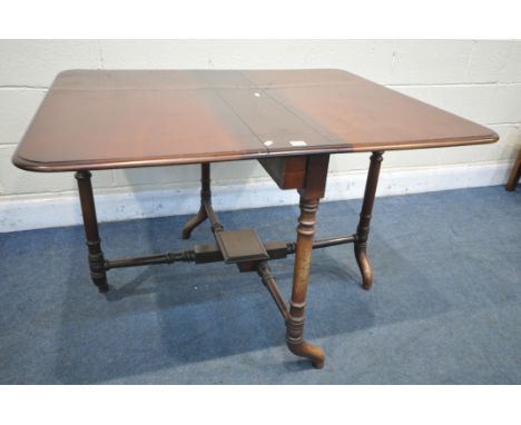 A VICTORIAN WALNUT SUTHERLAND TABLE, the fold down leaves supported on cylindrical gate leg, open width 110cm x closed 18cm x