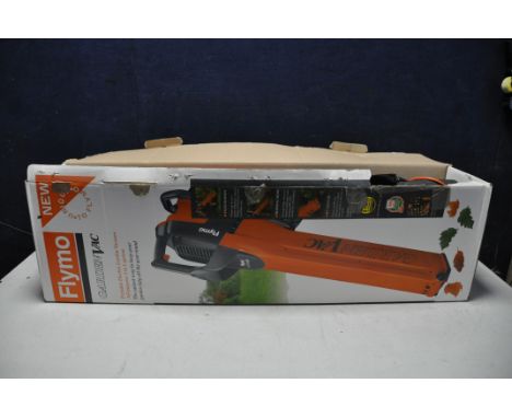 A FLYMO EV-650/1 GARDEN VAC in original box with bag and instruction manual (PAT pass and working)