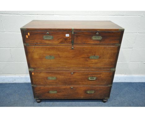 A 19TH CENTURY MAHOGANY MILITARY CAMPAIGN CHEST, with a brass banding and locks, splits into two section and fitted with two 