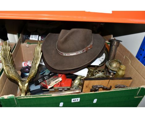 TWO BOXES OF BRASS WARES, FILM AND MUSIC MEMORABILIA, POSTCARDS, AND SUNDRY ITEMS, to include a brass eagle on a marble plint