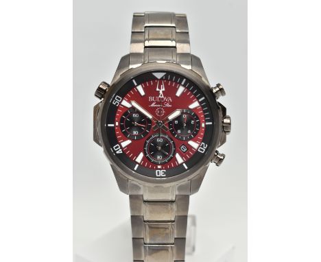 A GENTS 'BULOVA' CHRONOGRAPH WRISTWATCH, quartz movement, round red dial signed 'Bulova Marine Star', baton markers, three su