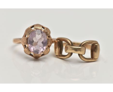 TWO 9CT GOLD RINGS, the first designed with an oval cut amethyst in an eight claw setting, to a textured openwork leaf style 