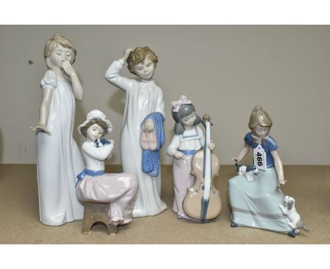 FIVE NAO FIGURES OF CHILDREN, comprising seated girl with puppies, girl on stool with puppy, girl with cello, boy in nightdre