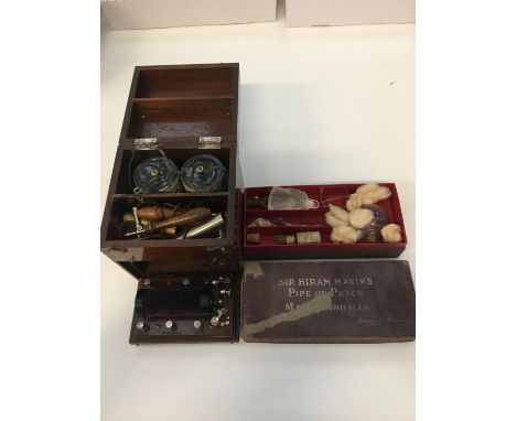 Boxed Edwardian electric massager and Sir Hiram Maxims pipe of peace 