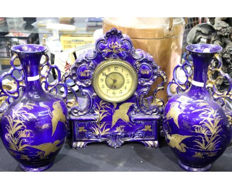 Victorian cobalt blue ceramic mantel clock and garniture pair by AG Harley Jones, Fenton, gilt decorated in the chinoiserie s