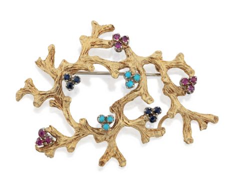 A ruby, sapphire and turquoise set brooch, of textured branching form with claw set trefoils of mixed cut rubies and sapphire