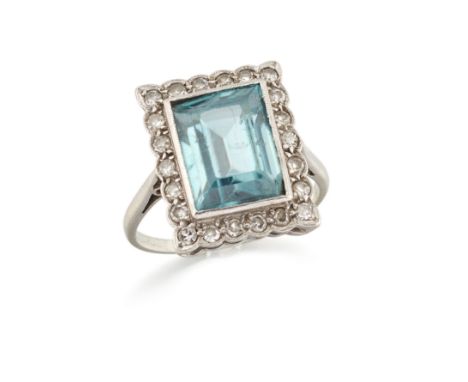 A blue zircon and diamond cluster ring,&nbsp;the rectangular step cut blue zircon approximately 11 x 8mm, within single cut d