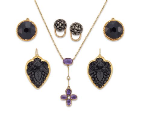 A group of jewellery,&nbsp;comprising: an Edwardian amethyst and seed pearl necklace; two pairs of black paste earrings with 