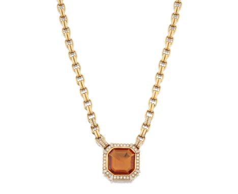 A citrine and diamond necklace, with an octagonal step cut citrine, approximately 19.5mm length, within brilliant cut and tap