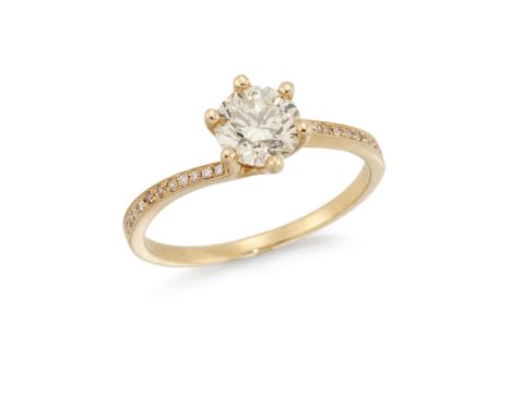 A diamond single stone ring, the single round brilliant-cut diamond in claw-set mount, to brilliant-cut diamond line shoulder