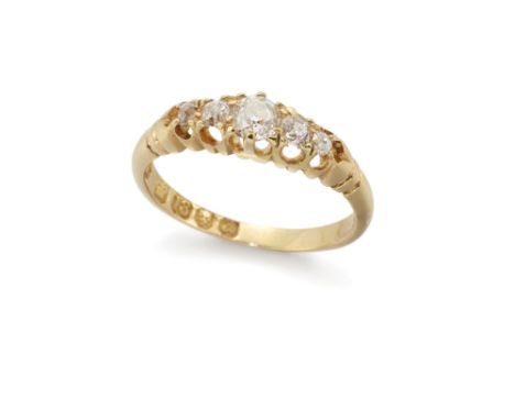 A late Victorian 18ct gold diamond five stone ring, the central old brilliant-cut diamond with graduated diamond two stone sh