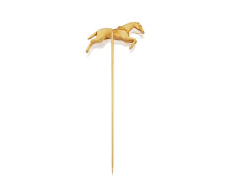 A gold stick pin, the finial in the form of a jumping horse, with plain pinCondition Report:  Approximate weight 9.24 grams.