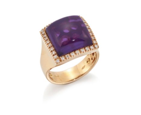 An amethyst and diamond cluster ring,&nbsp;the square cabochon amethyst within brilliant cut diamond surround, to tapering sh