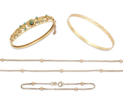 A small group of jewellery, comprising: an Italian flat section bangle with engine turned decoration, stamped 750; a 9ct gold
