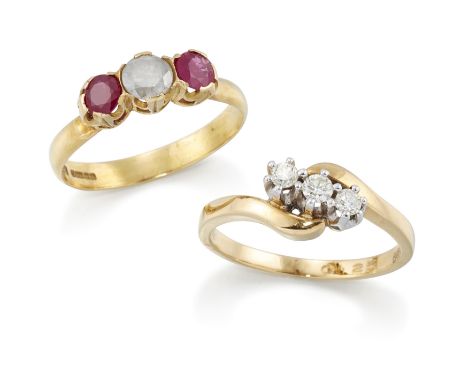 Two 18ct gold three stone rings, one of crossover design set with three brilliant cut diamonds, London hallmarks, ring size P