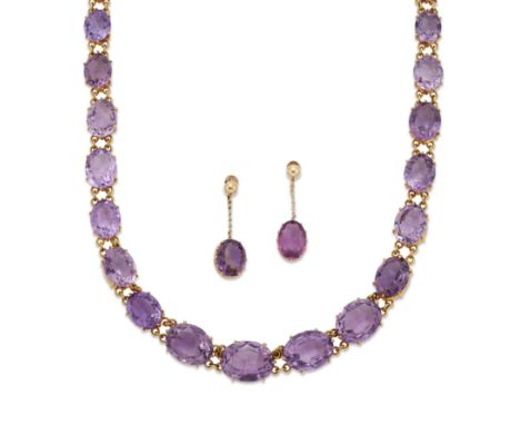 A late 19th century amethyst necklace,&nbsp;with a row of graduated oval mixed cut amethysts, claw set to gilt metal collets,