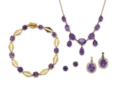 A group of amethyst jewellery, comprising: an early 20th century 9ct gold amethyst bracelet, with round mixed cut amethysts j