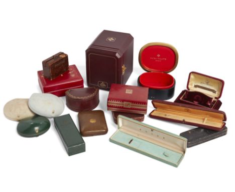 A group of various watch boxesIncluding: a rare leather Patek Philippe Ellipse box with red lining; an early Patek Philippe b