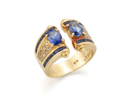 A sapphire and diamond ring, of torque design, each terminal with an oval mixed cut sapphire to tapering shoulder pavé set wi