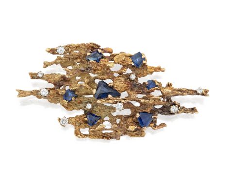 A sapphire and diamond brooch/pendant, possibly George Weil, the abstract brooch claw set with scattered step cut shield shap