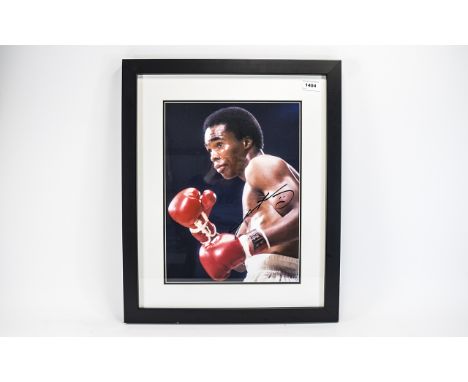 Boxing Interest. Signed photo Sugar Ray Leonard. Black glazed frame. Ideal collectors or charity auction item. Overall size i