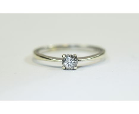 18 Ct White Gold Set Single Stone Diamond Ring the round brilliant cut diamond of good colour. Marked 25 pts to shank. Fully 