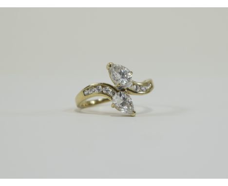 9ct Cluster Ring Featuring two teardrop shaped stones in curved snake like formation