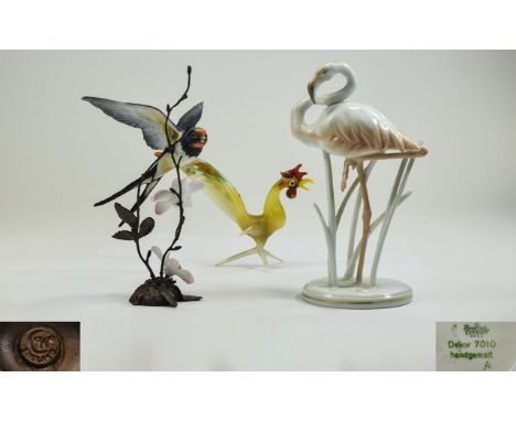 Rosenthal Handmade Fine Stork Figurine. 5.5 inches high. Plus a very fine hand painted metal and ceramic bird figure. 5.5 inc