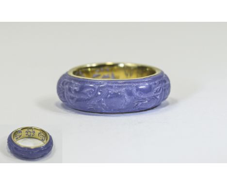 14 Carat Gold and Jade Band Ring marked 858 -14 ct ring size O-P. Jade - Purple. Excellent condition. 4.3 grammes.