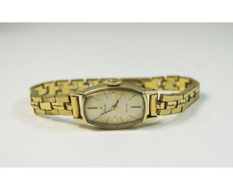 Ladies Omega DeVille Cocktail Watch with gold plated and steel case. Silvered dial with gold coloured hands and batons. Manua