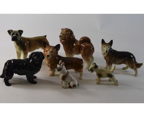 Collection of Seven Ceramic Dog Figures, some Melba Ware including Boxer, Jack Russel, Terrier, Border Collie etc