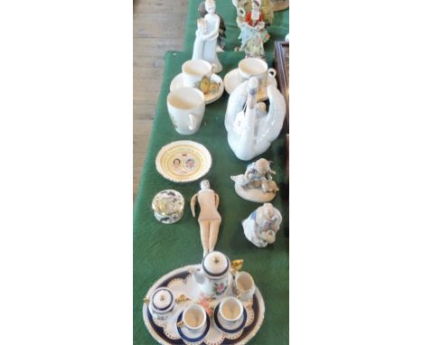 A Lladro model of a large swan, numbered 5231, together with a Royal Worcester Moments figurine (Sisterly Love), Royal Commem