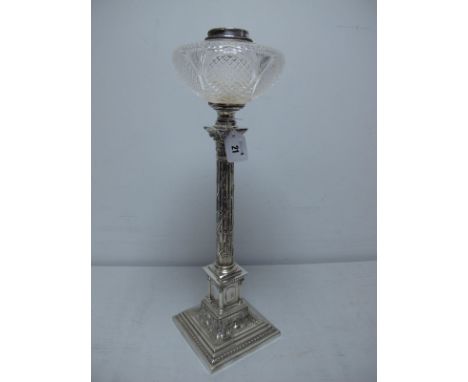 A Decorative c.Early XX Century Plated Corinthian Column Oil Lamp, with ivy leaf decoration and cut glass font (lacking burne