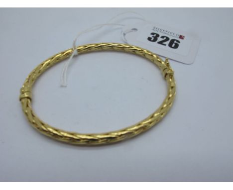 A Modern hinged Bangle, of plaited design, stamped "375" (7.2grams). 