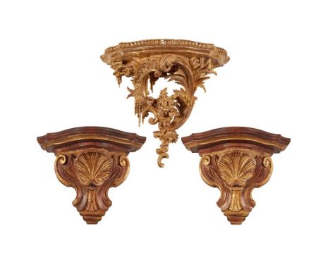 carved with shell motifs and C scrolls, together with a GEORGIAN STYLE GILTWOOD WALL BRACKET, 19TH CENTURY, carved with rocai