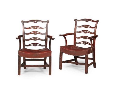 with pierced ladder backs above curved leather upholstered seats flanked by scrolled open arms, raised on channel moulded squ
