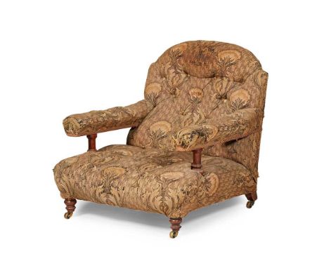 the arched button-upholstered back above a deep seat flanked by padded open arms with turned supports, raised on turned legs 