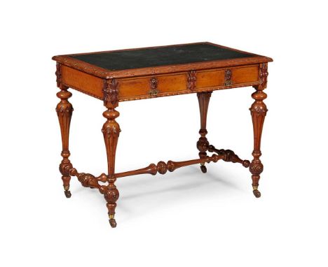 the top with a black insert writing surface and bead moulded edge, above two short frieze drawers, raised on turned, beaded, 