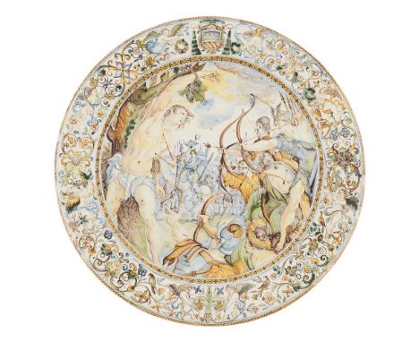 the centre painted with the martyrdom of Saint Sebastian, the broad scrolling foliate border painted with flowers, birds and 