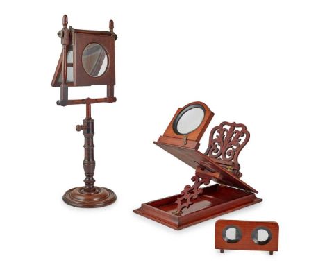 the first, a Georgian example, on a turned column and domed foot, 63cm high; the second, a Victorian example, with hinged mag